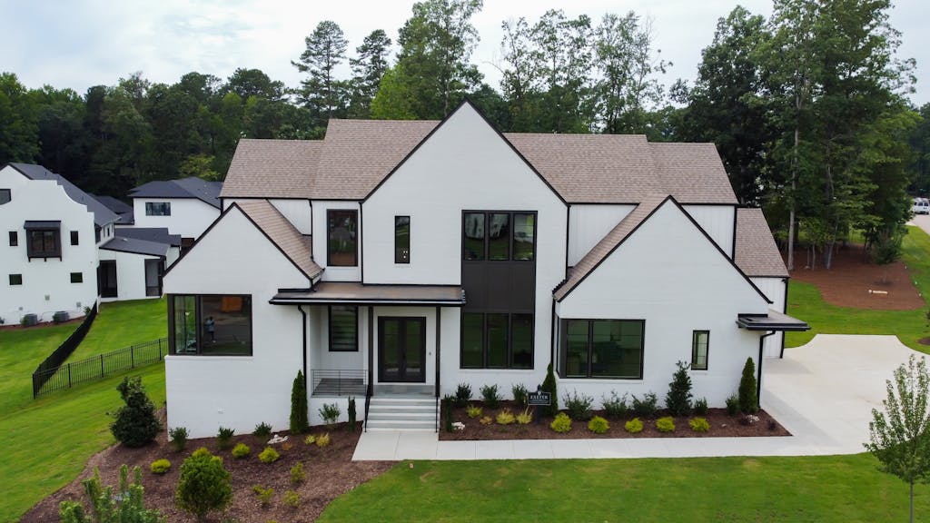 Aerial view of modern house architecture in Raleigh, NC suburb.